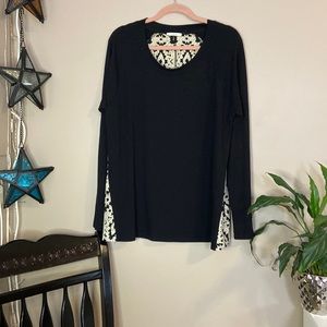 Black long sleeve knit top with south west style printed back